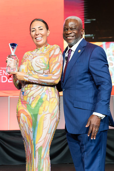 Natasha receiving an award